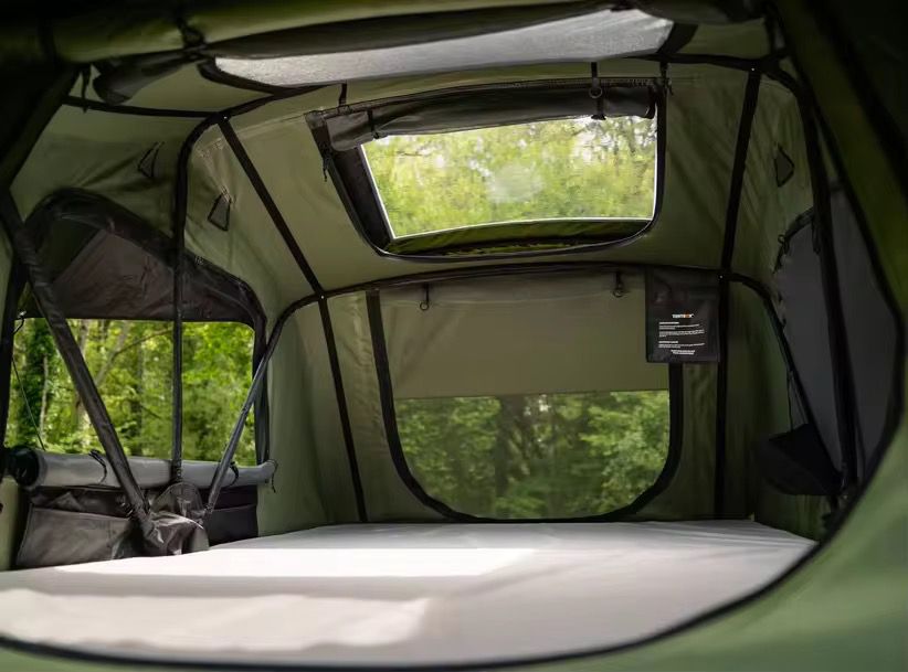 Alpine 2 interior showing the sleeping platform, mesh windows and roof skylight